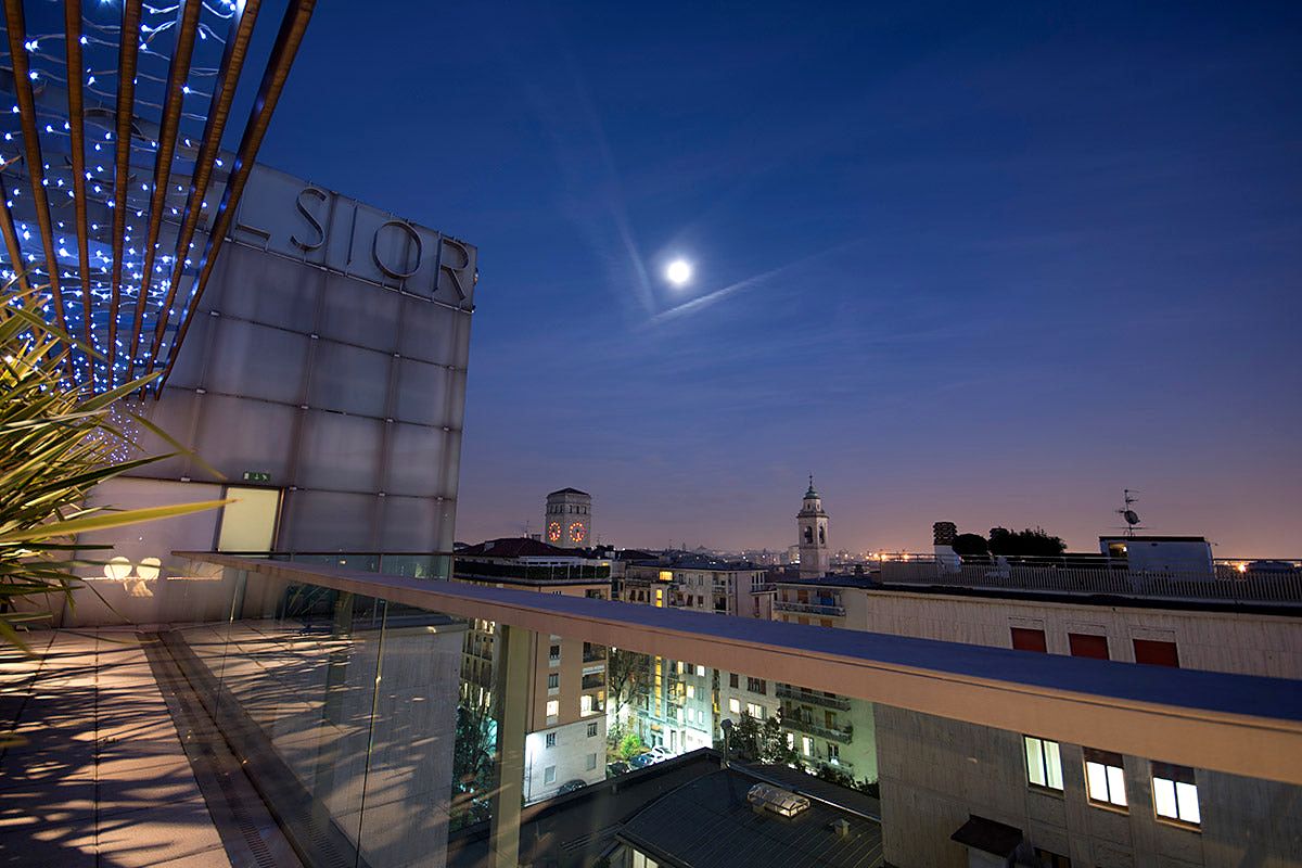 Rooftop terrace at dusk at Hotel Excelsior San Marco