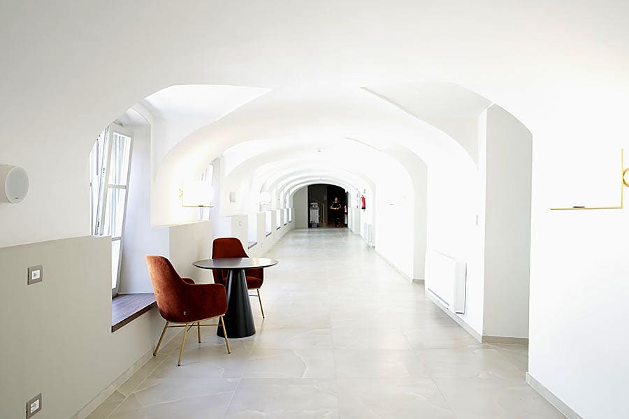 Cloister-style corridor at Palazzo Santo Spirito