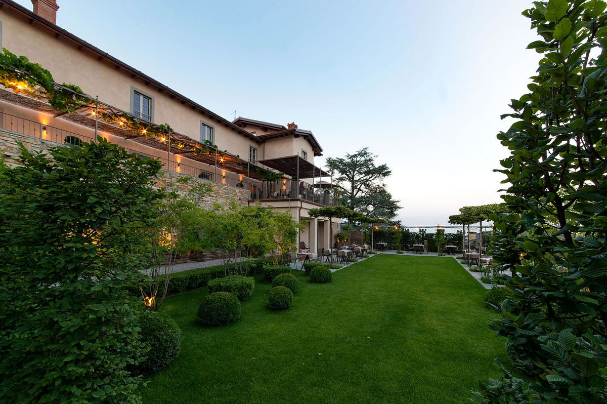 Lawn and terraces of Relais San Vigilio al Castello