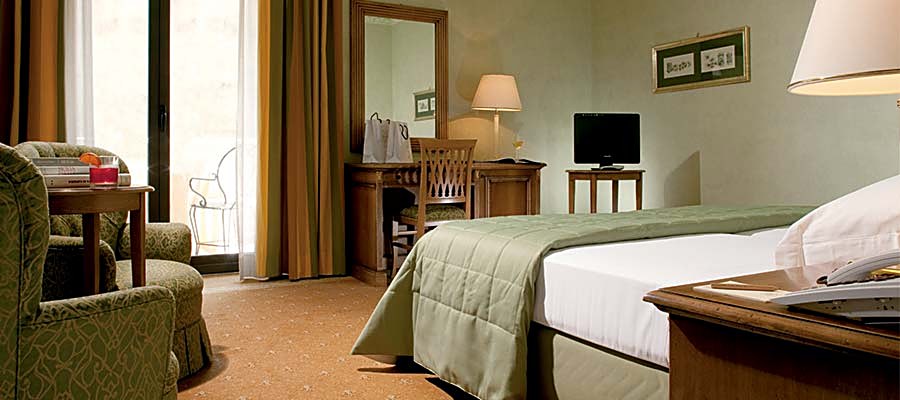 Classic-style guest room at Katane Palace Hotel