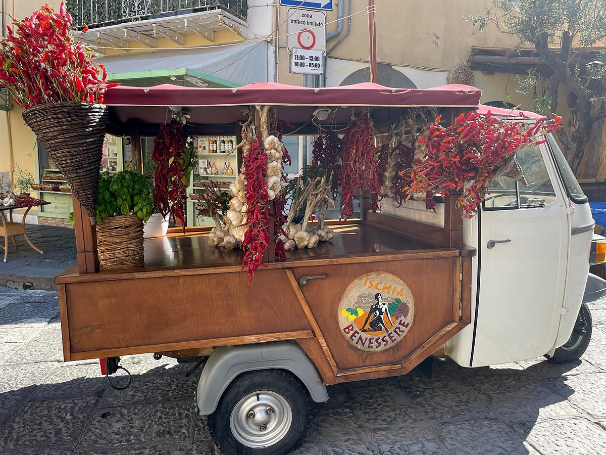 Dried chillies and garlic on an Ape van on Ischia