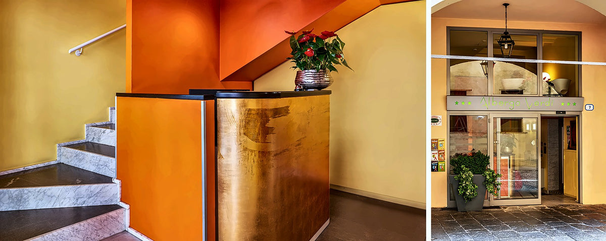 Orange reception area and entrance hall of Albergo Verdi
