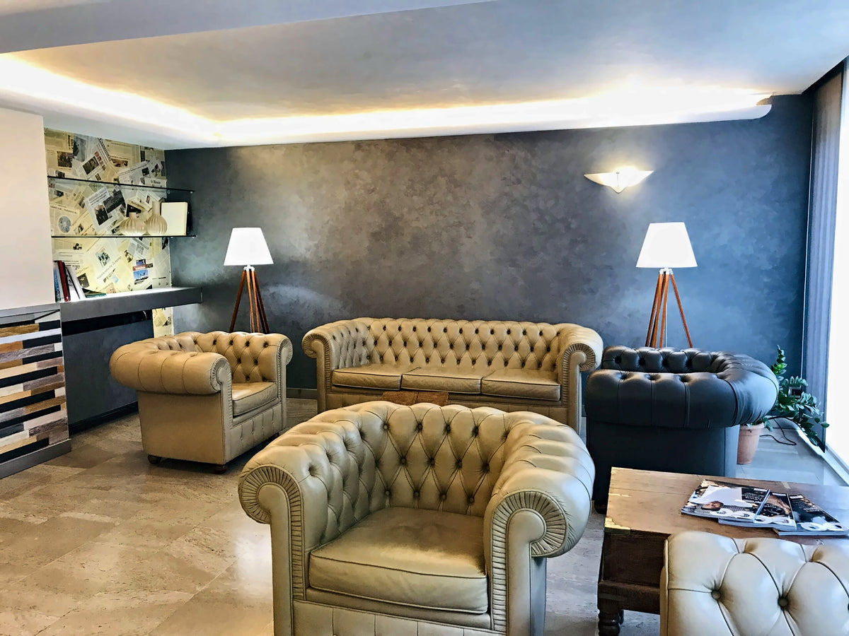 Lounge at Hotel Europa with leather Chesterfield armchairs and sofa
