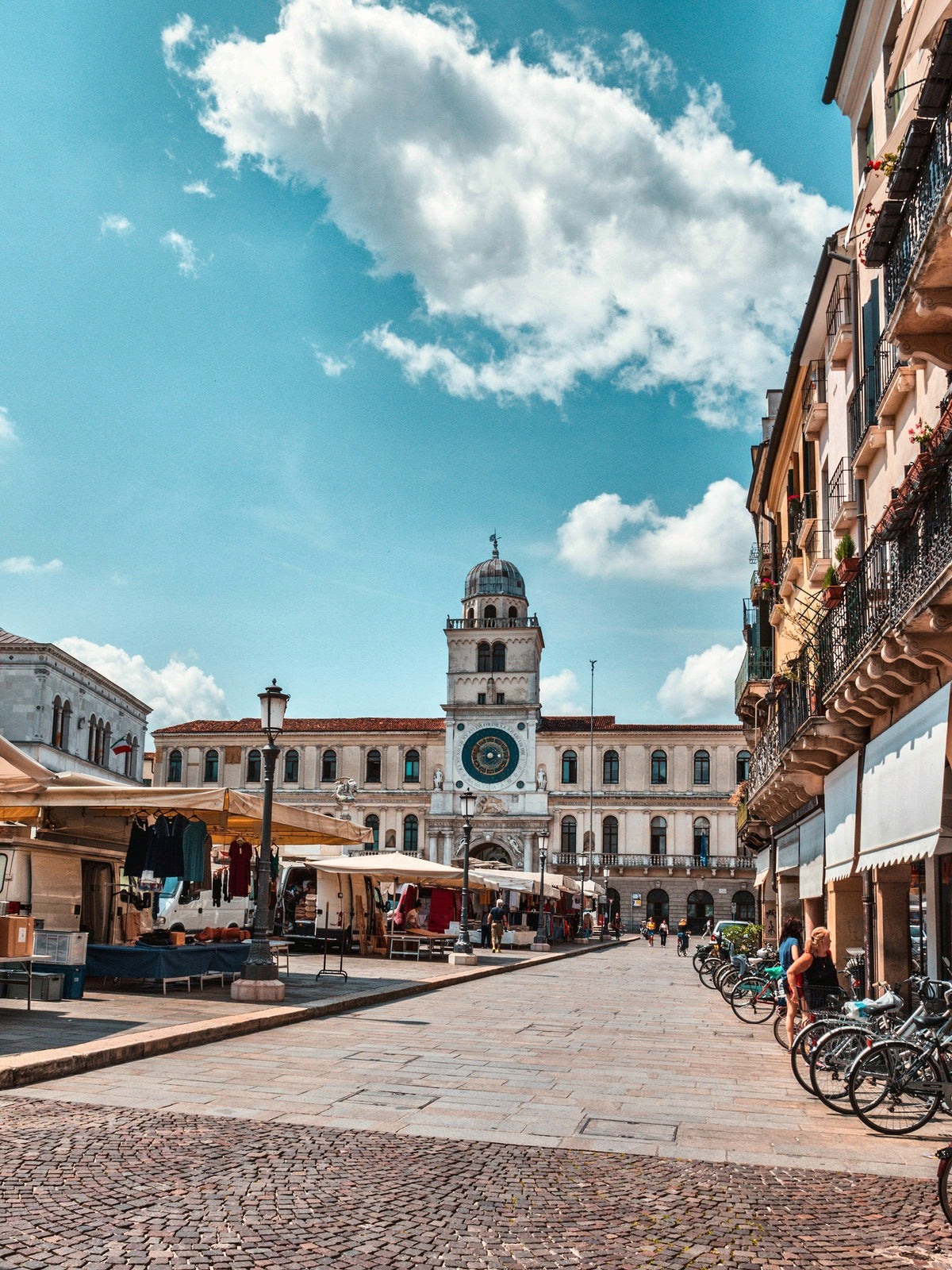 Piazza dei Signori and its clock tower on a bright morning