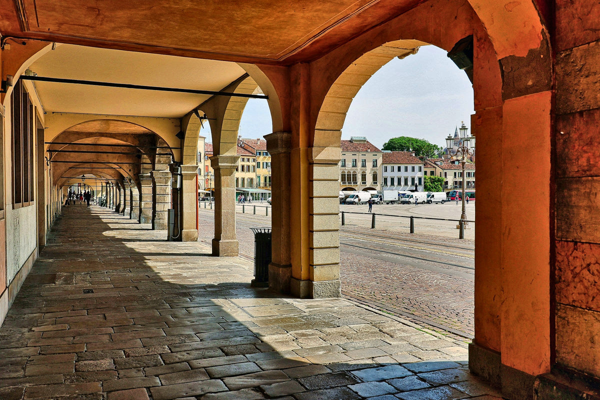 Afternoon sun under a portico of the old town