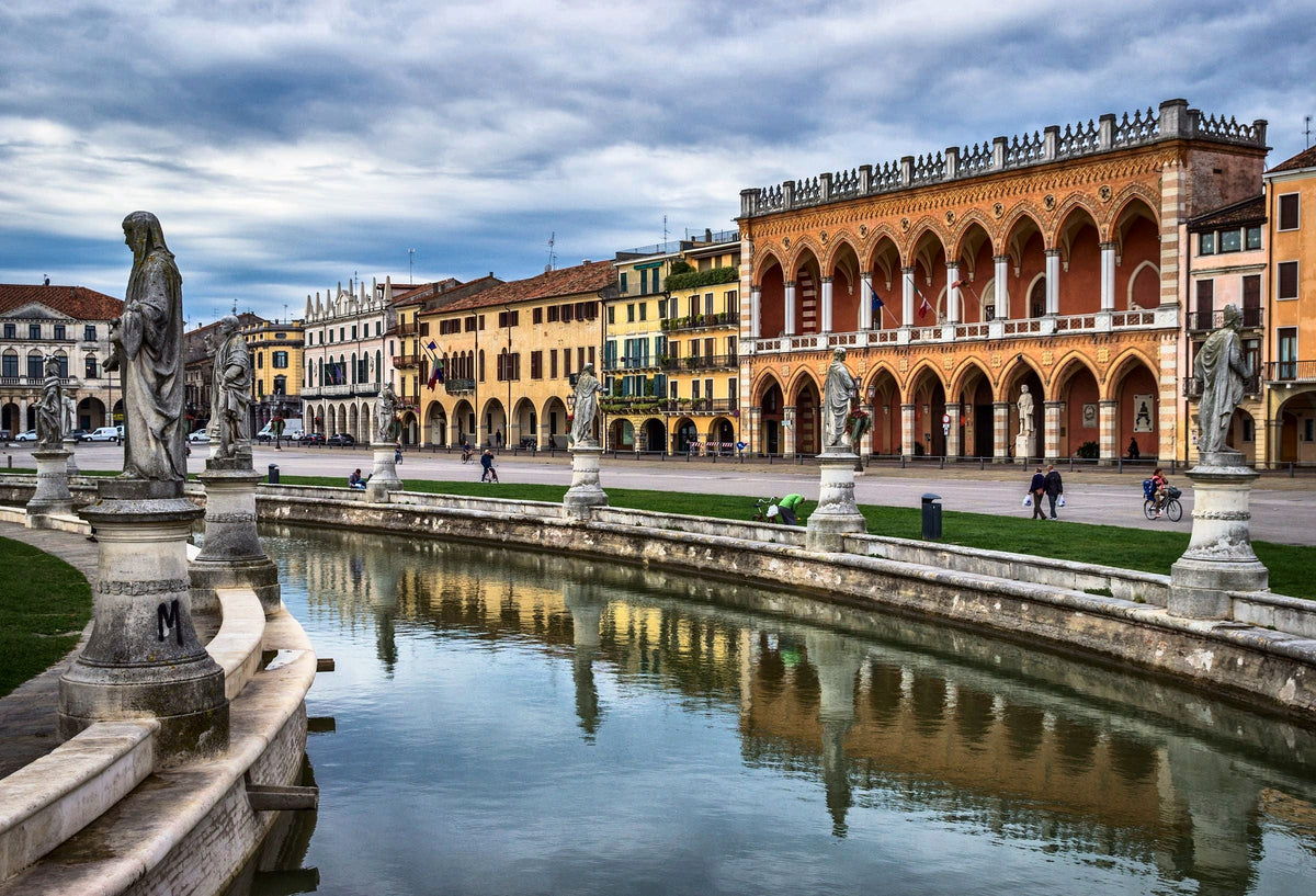 Statues along the elliptical canal of Prato della Valle