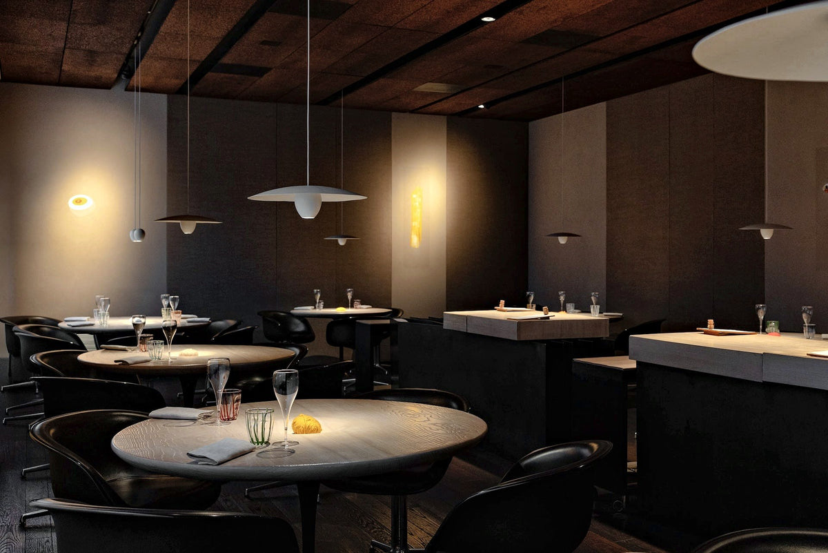 Minimalist dining room with round tables at Le Calandre, Rubano