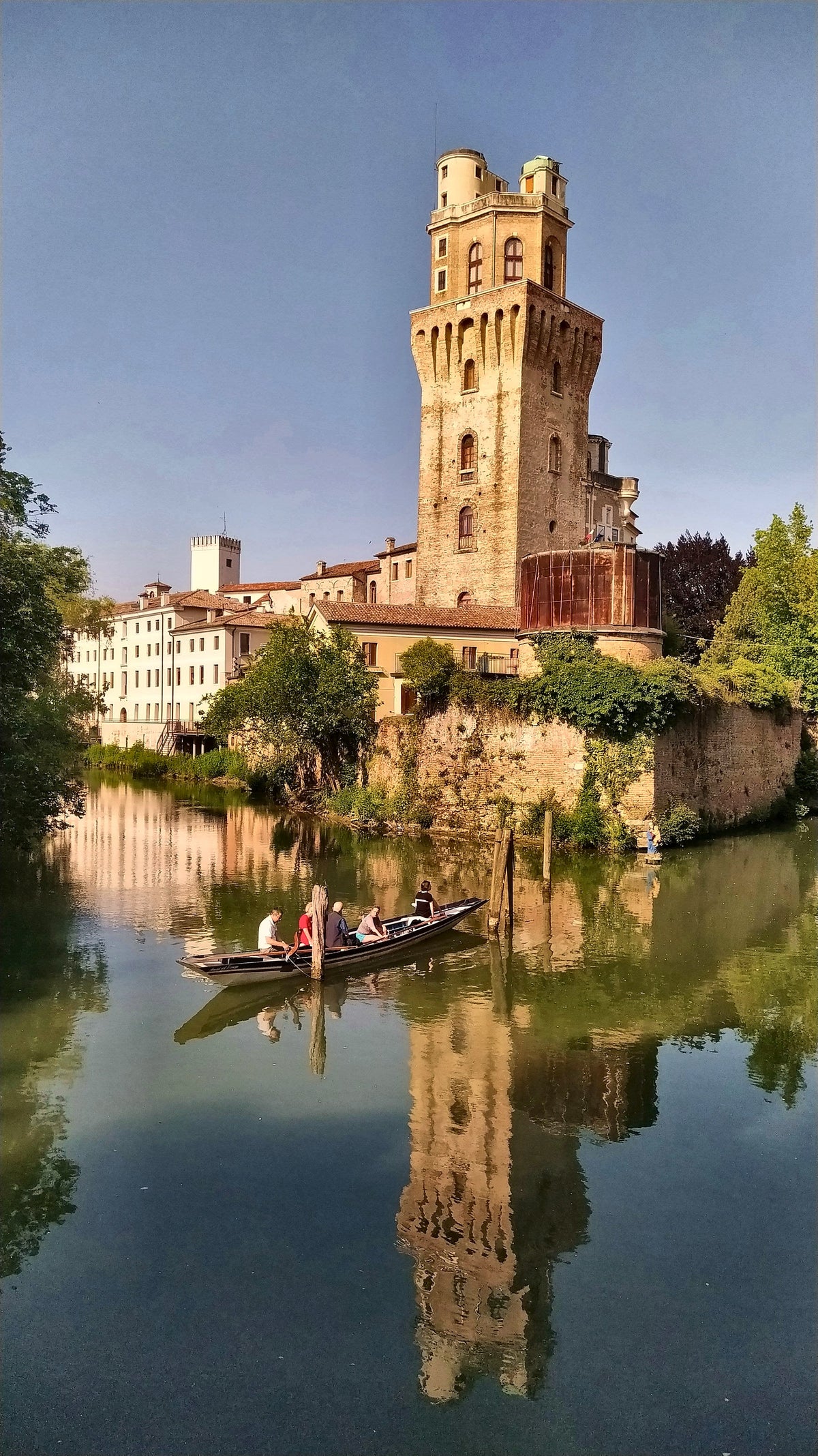 A rowing boat on the river below La Specola
