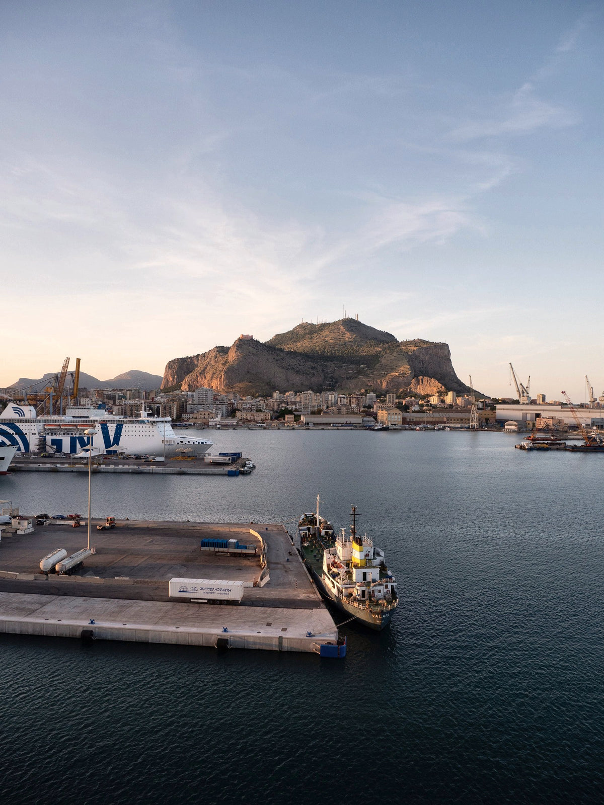 The port of Palermo at dusk, below the cliffs of Monte Pellegrino
