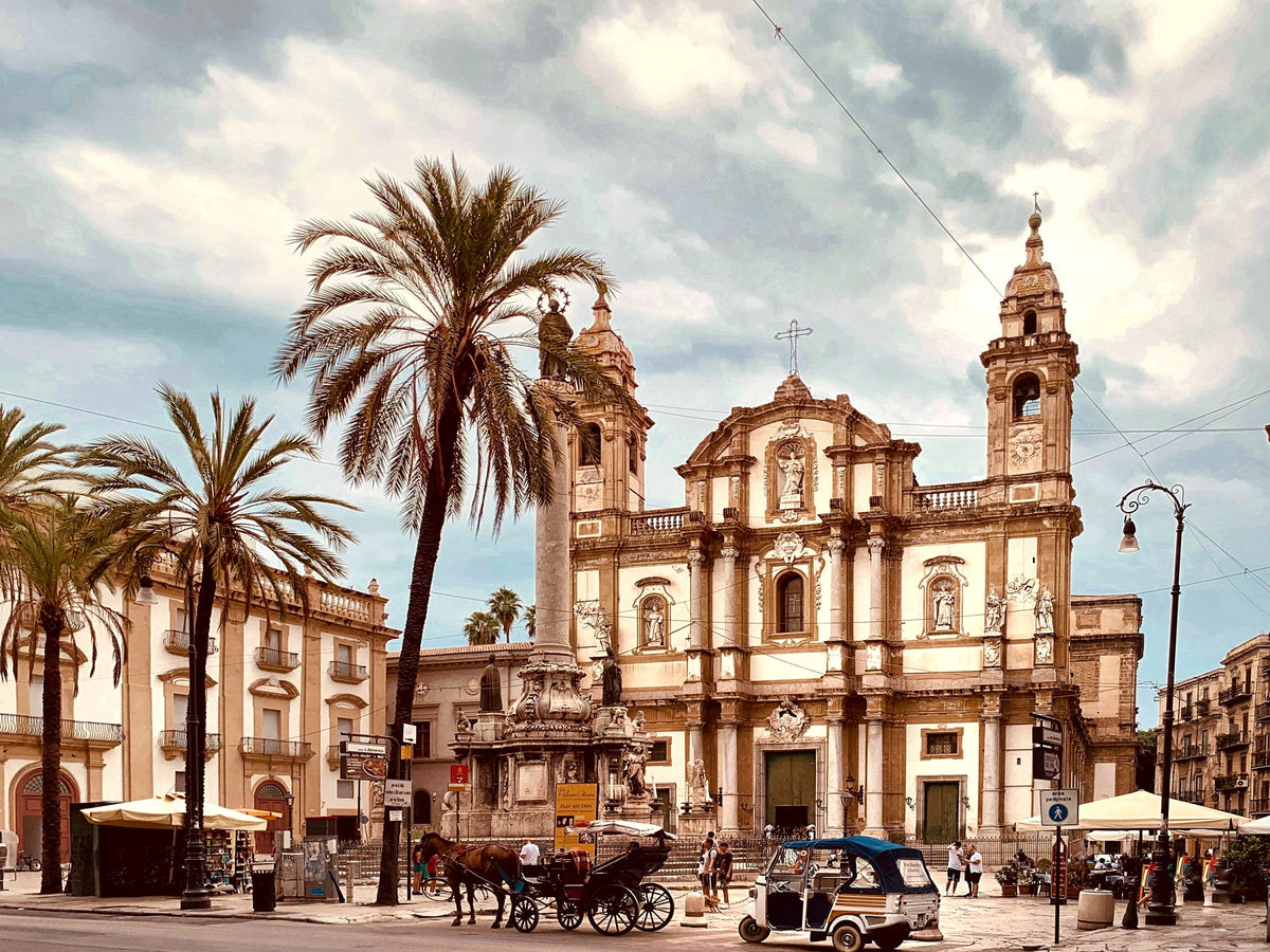 Piazza San Domenico, with its column, palms and Baroque church
