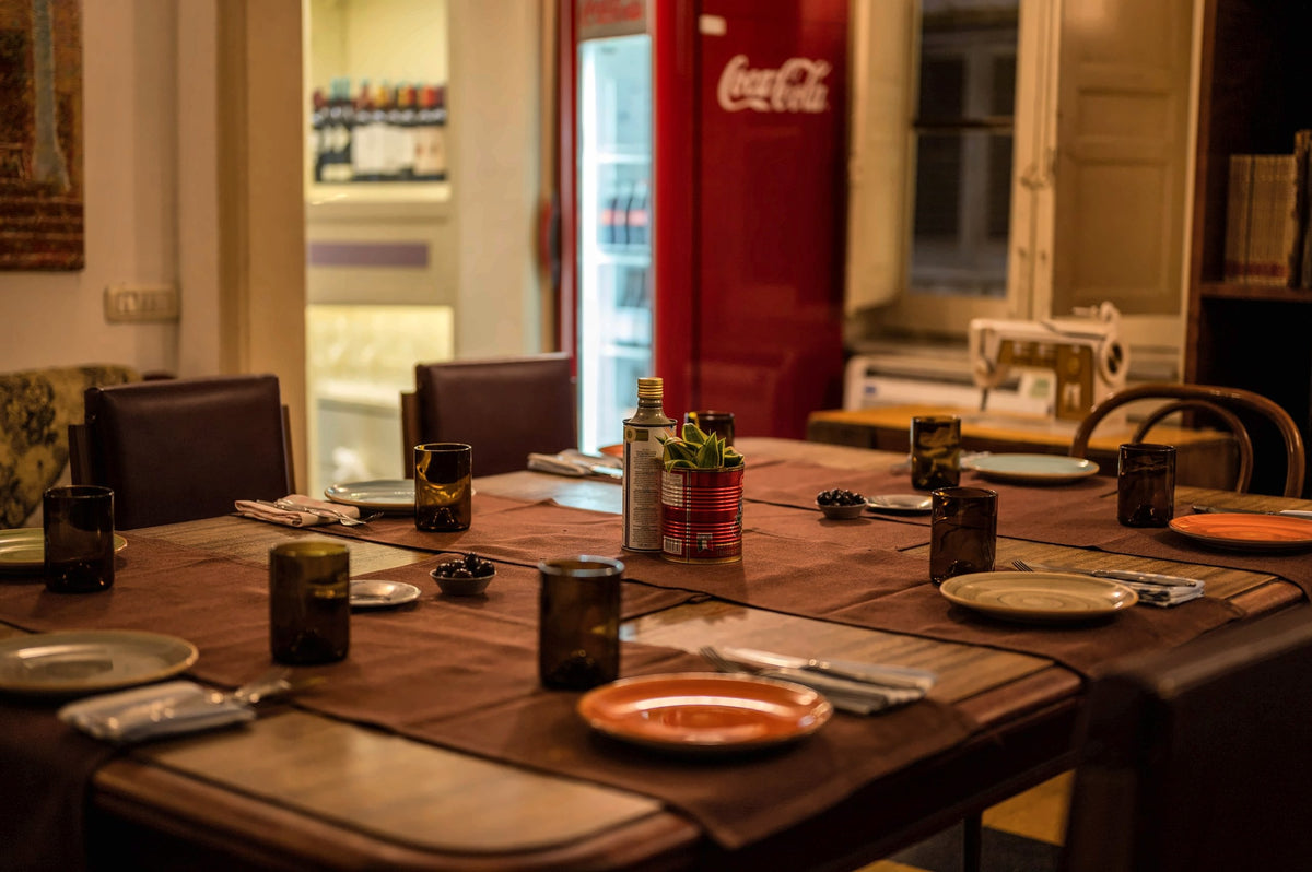 A set table near the bar at Locale Palermo