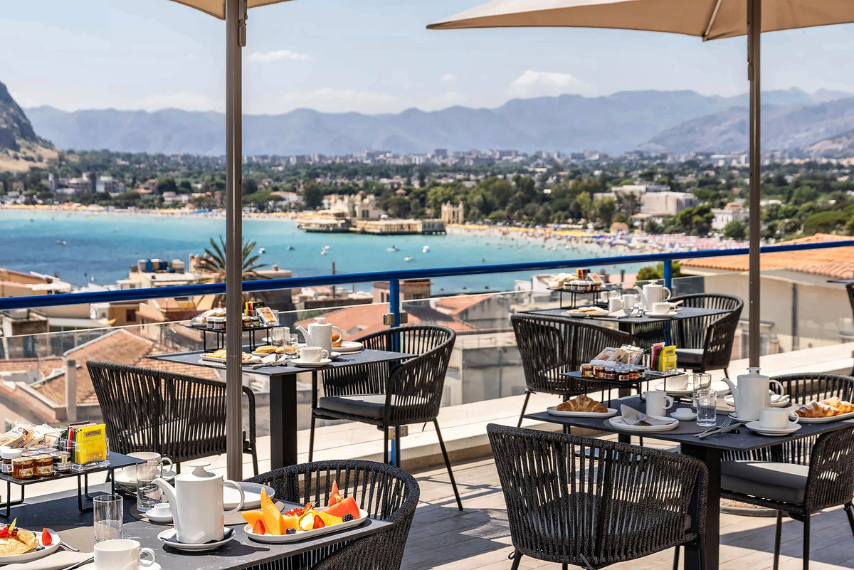 Breakfast on the terrace of Mondello Glam Hotel, overlooking the bay