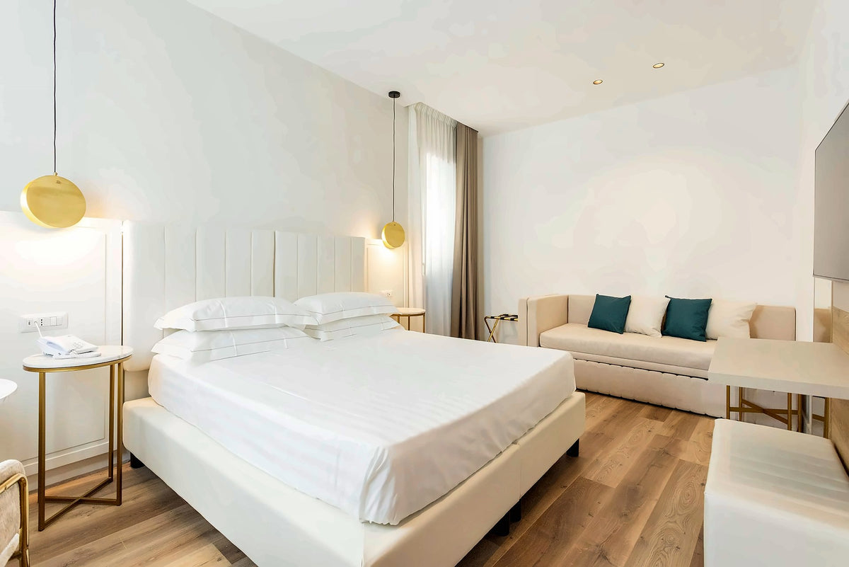 A bright Prestige room at Mondello Glam Hotel