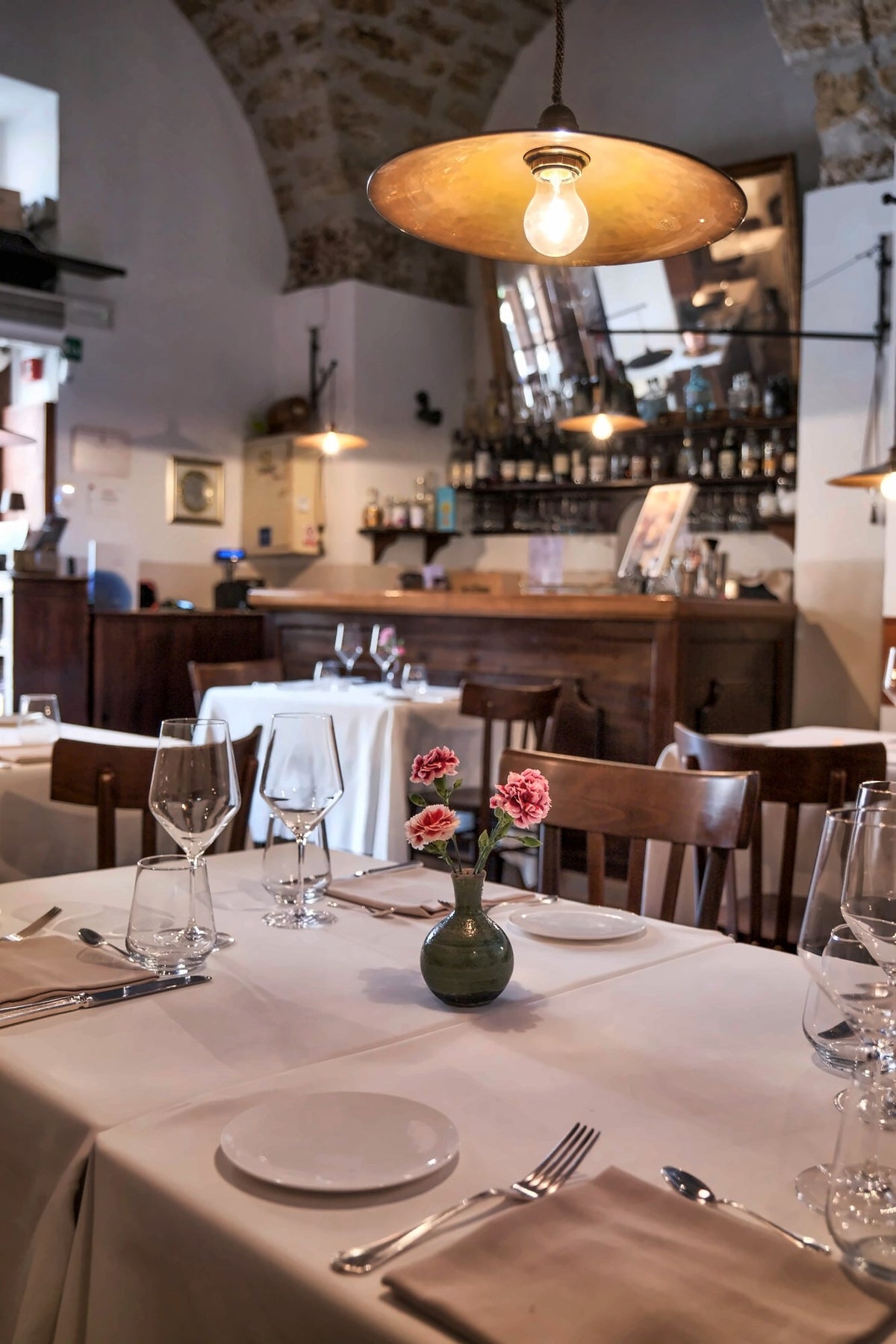 The vaulted dining room of Osteria dei Vespri