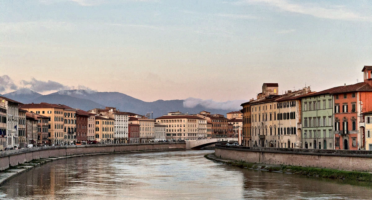 Evening on the Arno with the Pisan Mountains behind the city