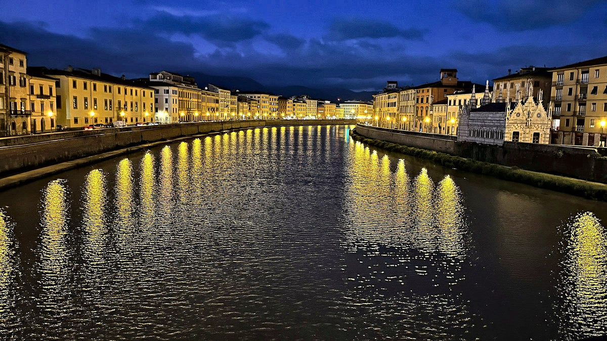 The Arno by night, with Santa Maria della Spina lit on the left bank
