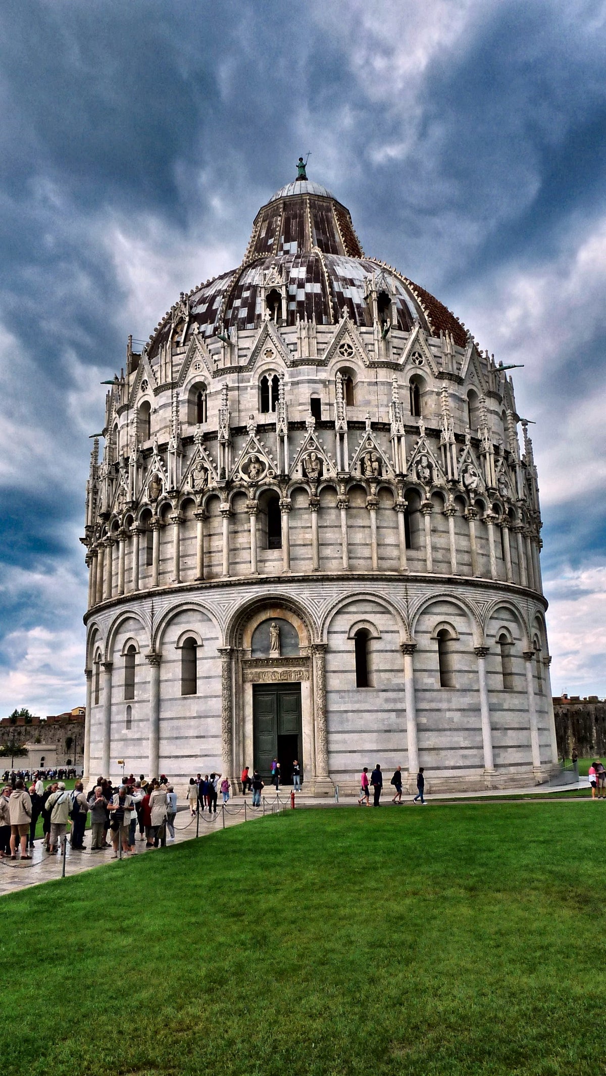 The Baptistery under a dramatic sky