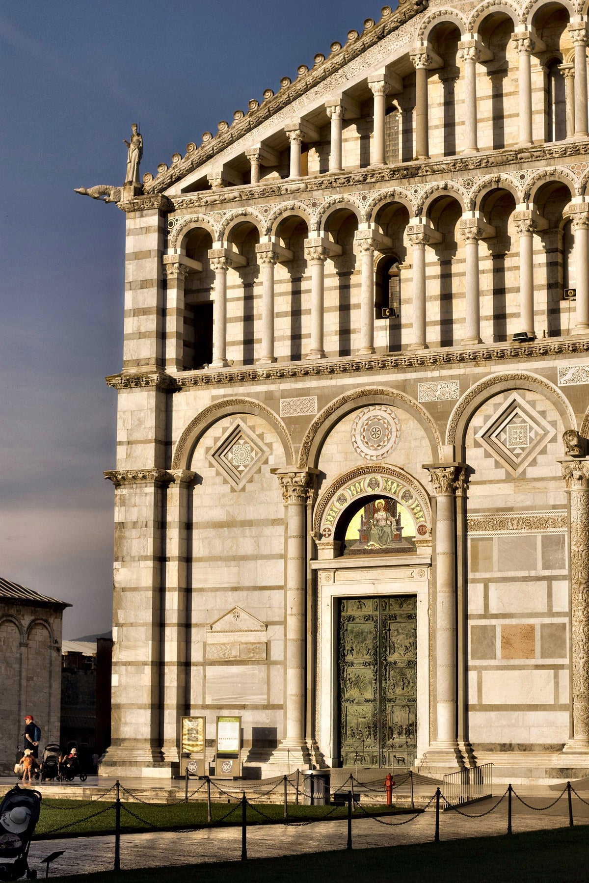 Late sun on the marble facade of Pisa Cathedral