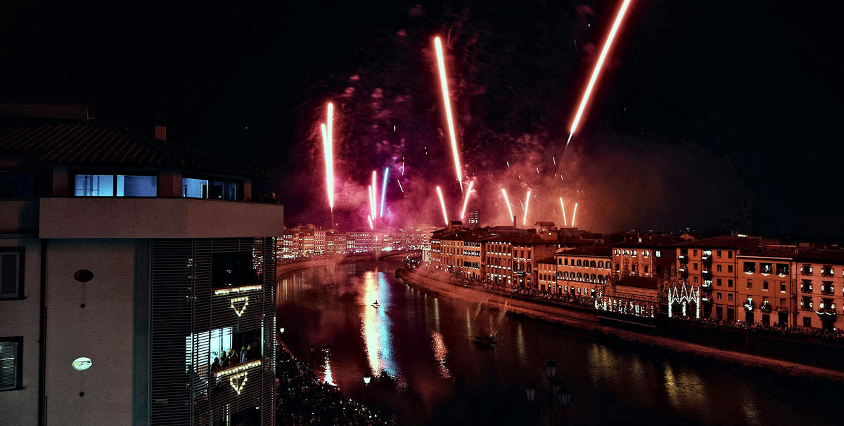 Fireworks over the Arno on the night of the Luminara di San Ranieri