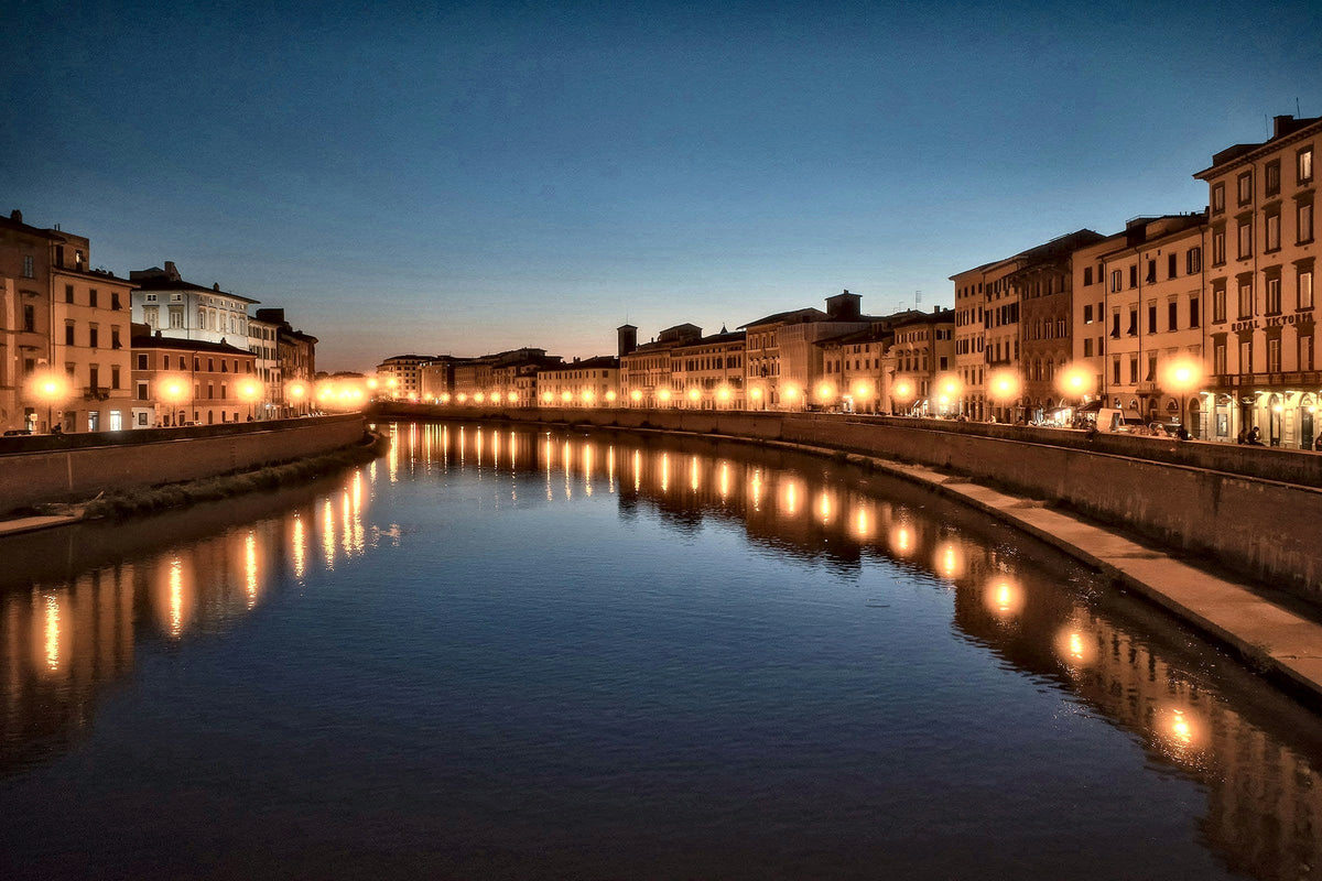Blue hour on the Lungarni, the street lamps reflected in the Arno