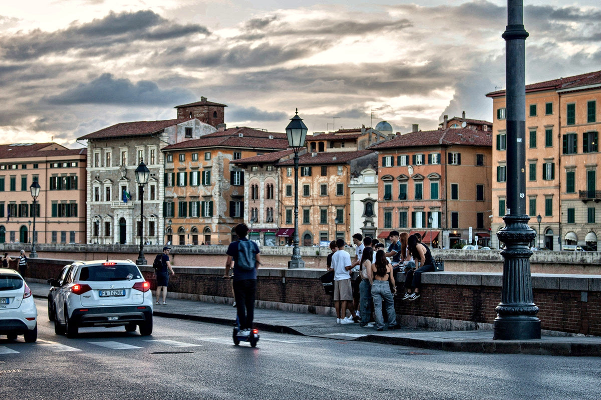 Evening on the Lungarno, students gathered along the river wall