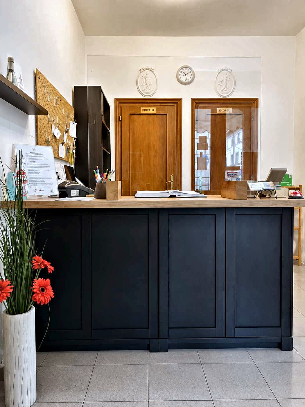 The reception desk of Hotel Cecile