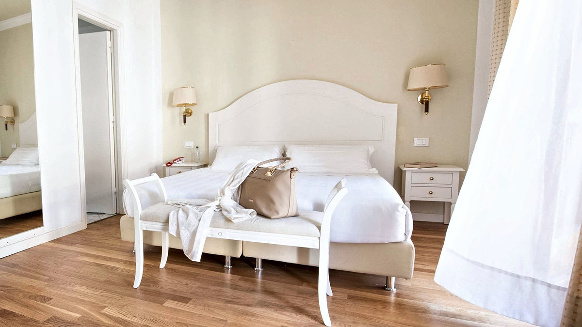 A bright Superior room at Grand Hotel Duomo