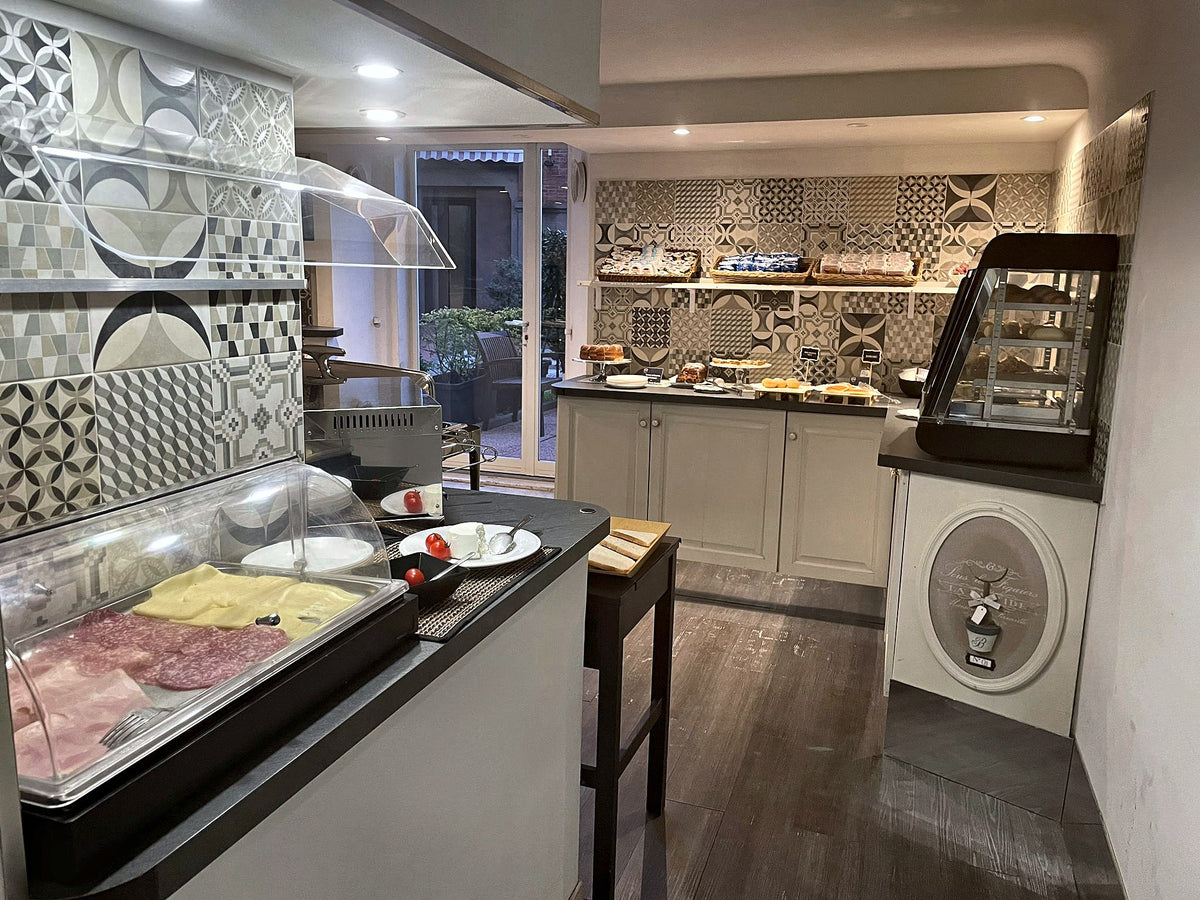 The breakfast counter at Hotel Villa Tower Inn