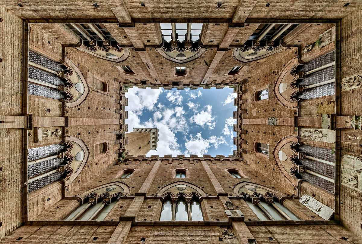 Looking up from the Palazzo Pubblico courtyard