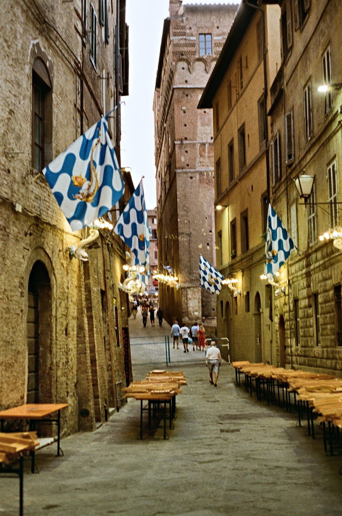 Long tables set for a contrada dinner
