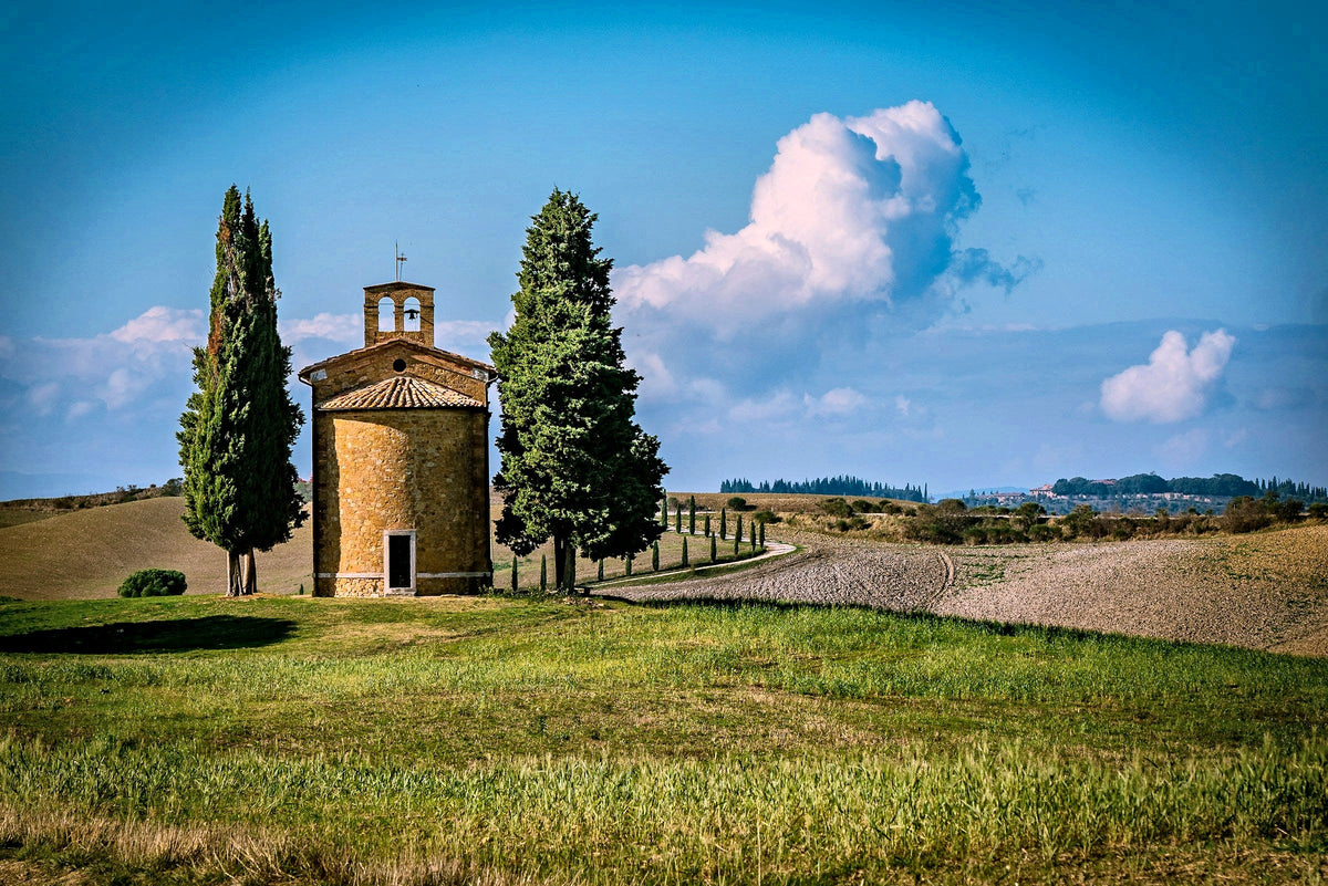 The Vitaleta chapel between its cypresses