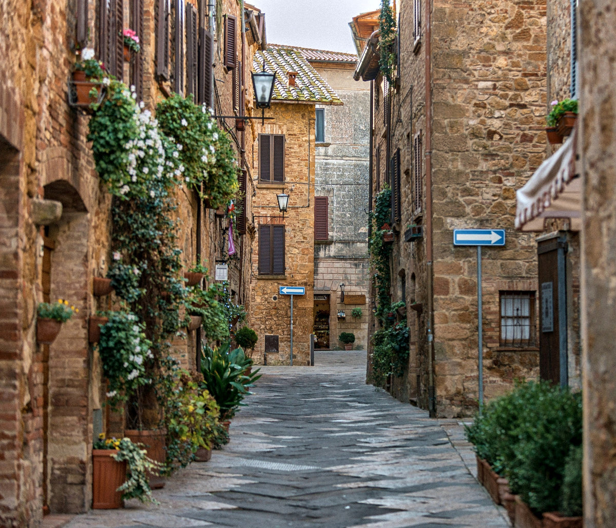 A flower-lined lane in Pienza