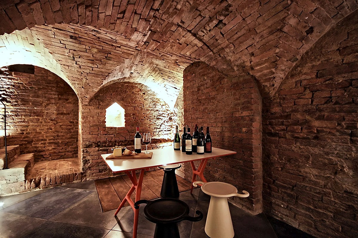 Brick-vaulted wine-tasting cellar at Hotel Palazzetto Rosso