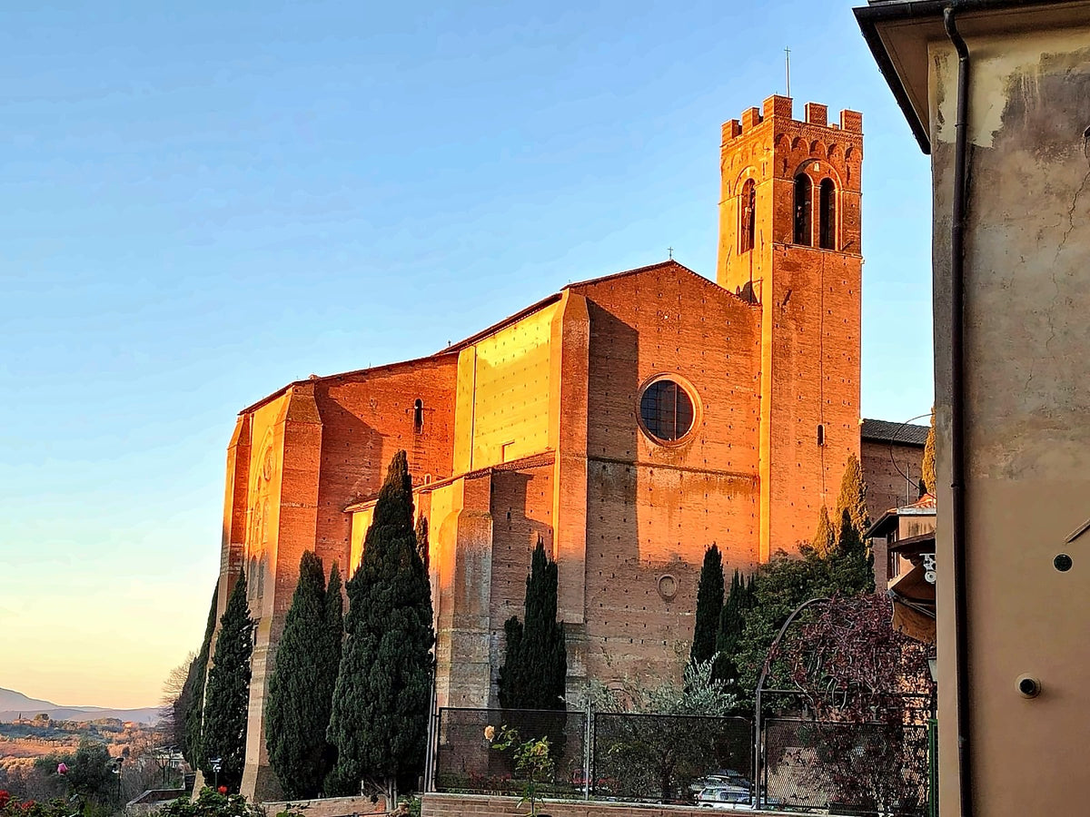 Basilica of San Domenico glowing at sunset, near Albergo Bernini