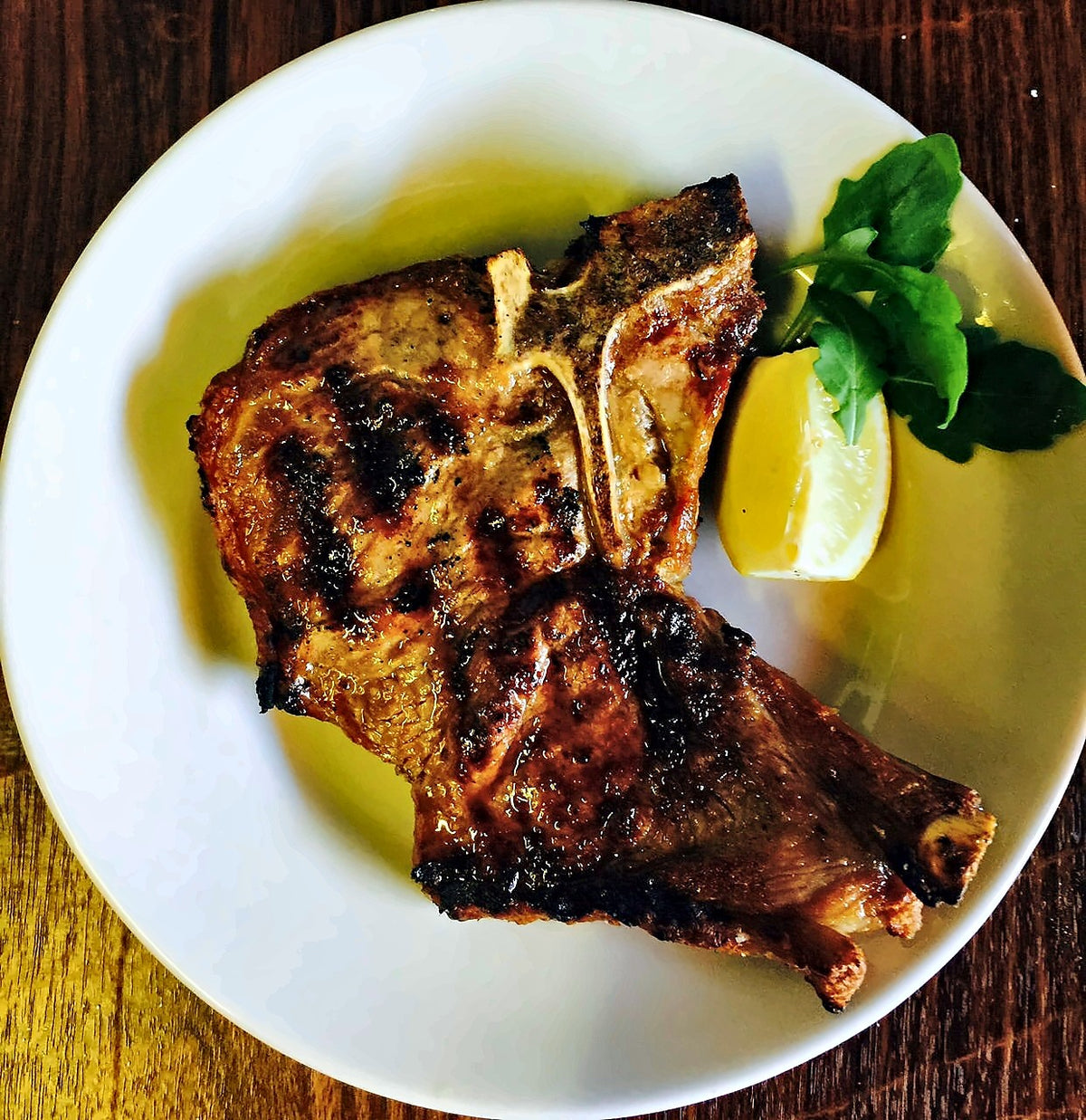 Grilled meat with lemon at Antica Trattoria Papei