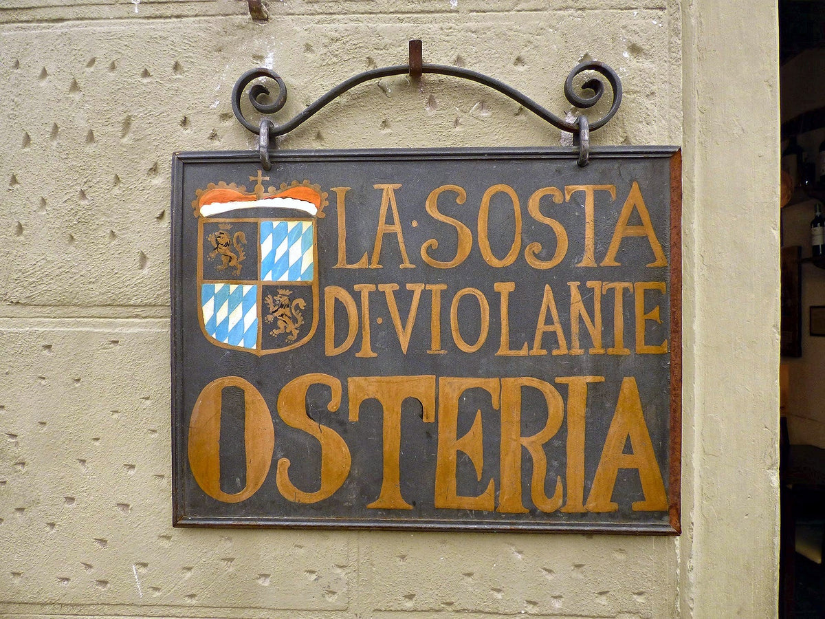 Painted sign of Osteria La Sosta di Violante