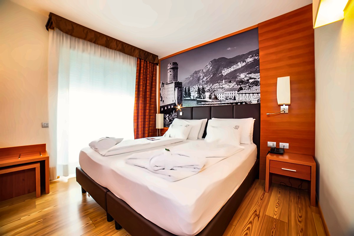 Suite with mountain photo wall at Best Western Hotel Adige