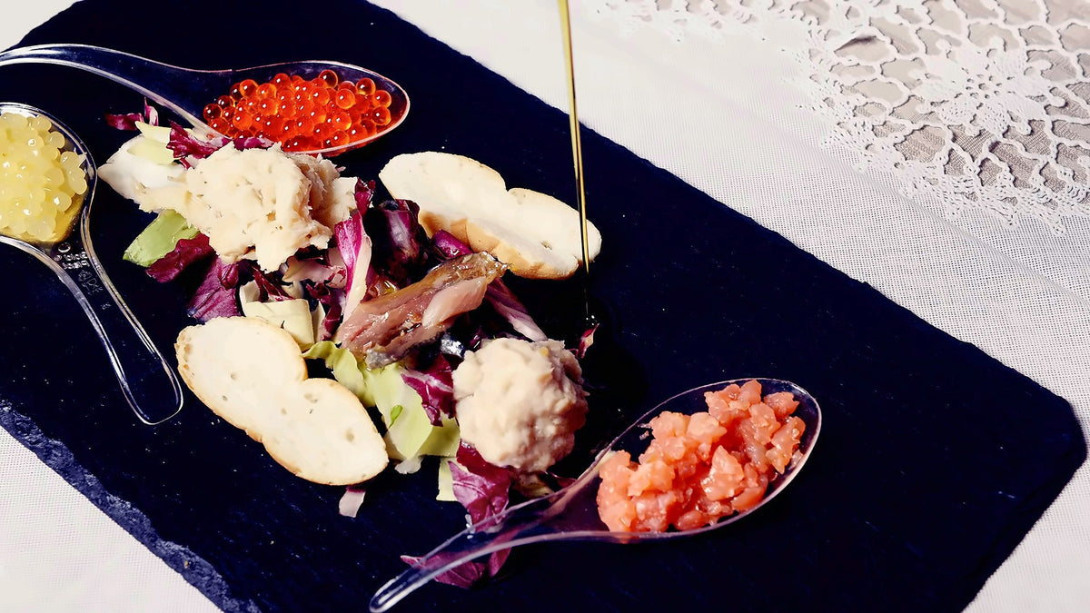 Seafood starter served on slate at Al Vò