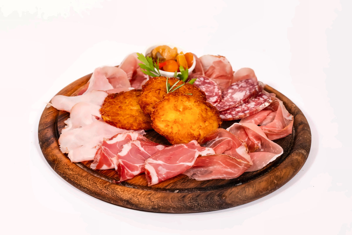 Board of cured meats and potato tortel at Chistè