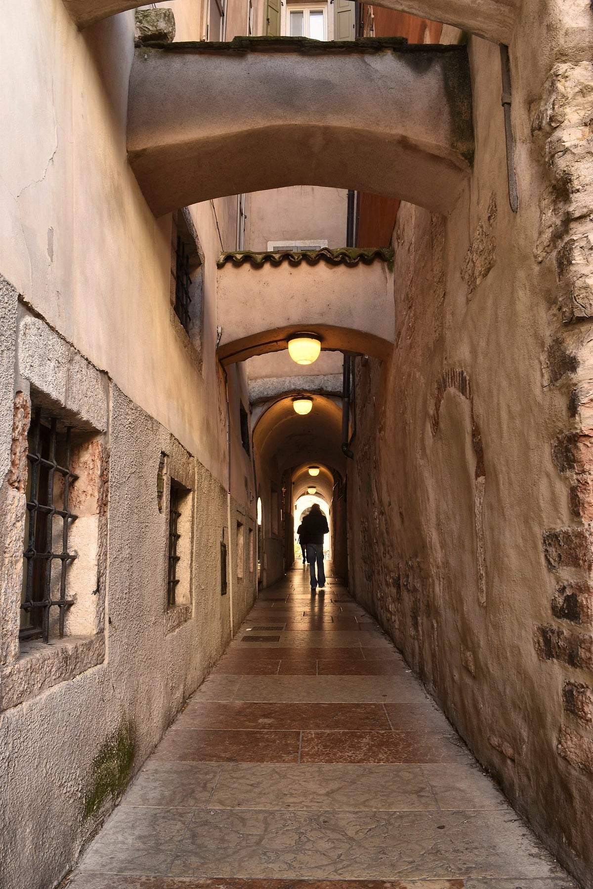 A covered stone passage in the old town