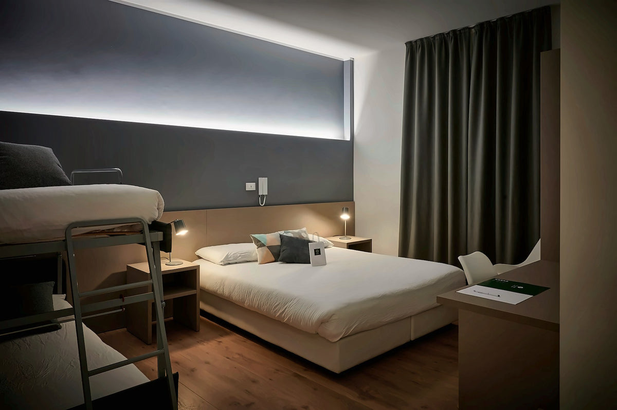 Contemporary room with soft lighting at Lainez Rooms & Suites