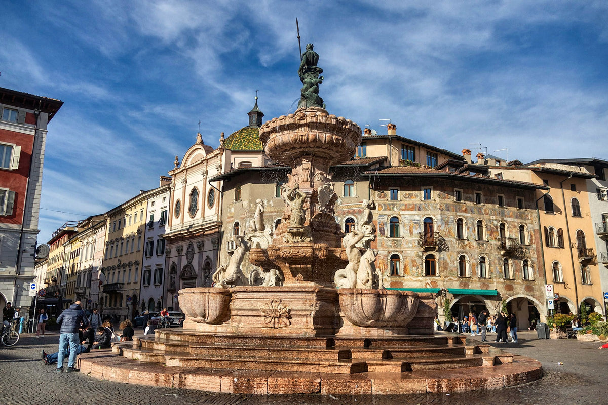 The Neptune Fountain against the painted palazzi of Piazza Duomo