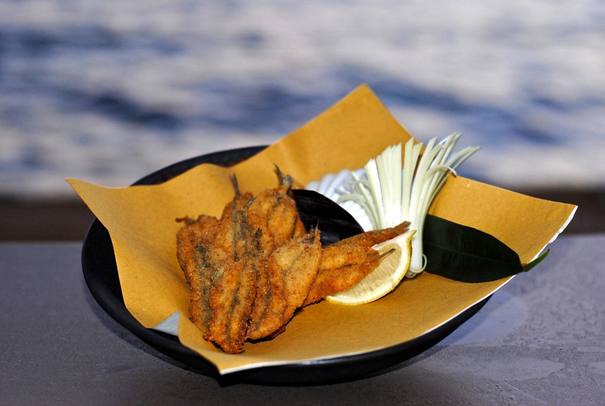 Breaded fried sardoni by the sea at Tre Merli