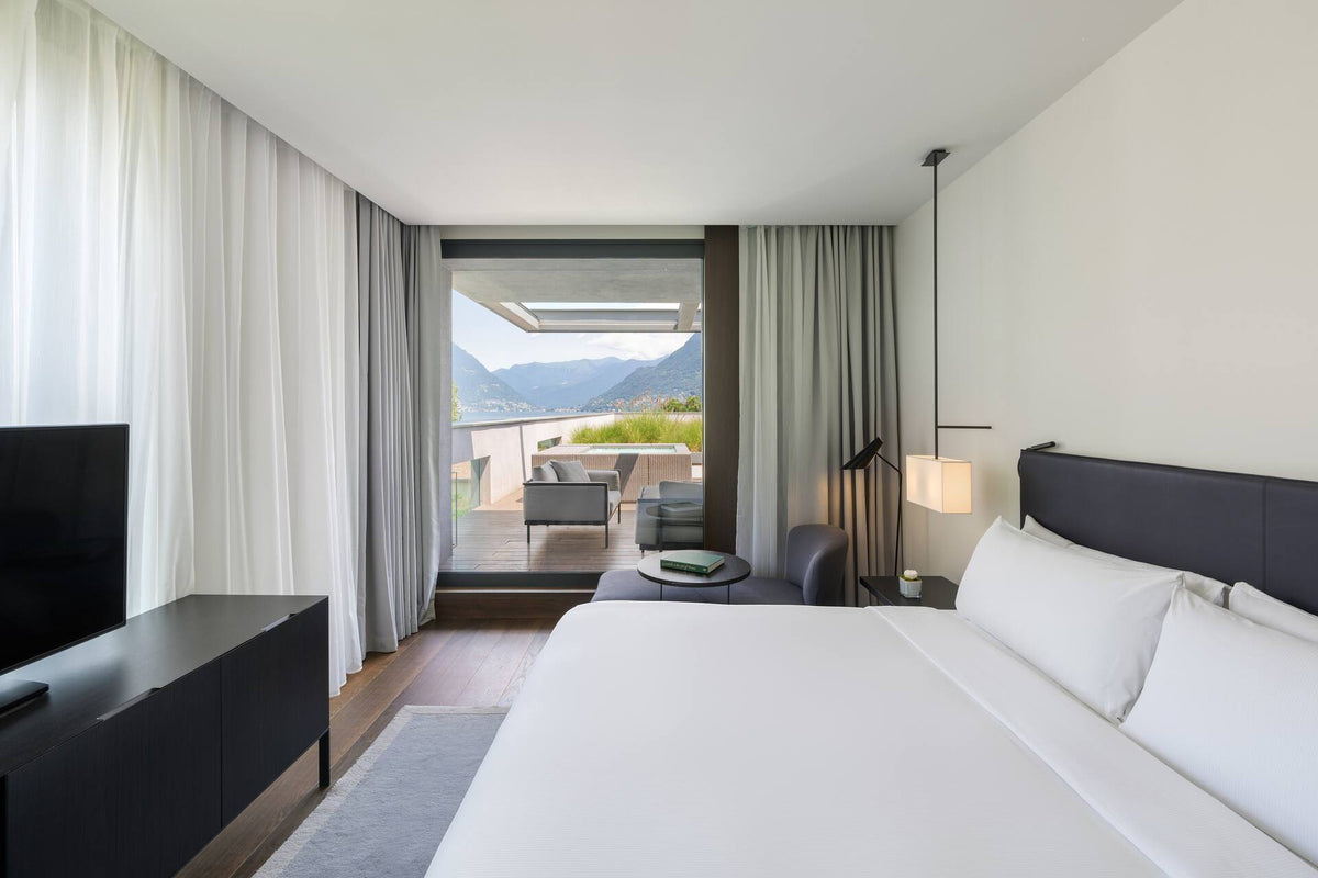 A guest room with lake view at Hilton Lake Como