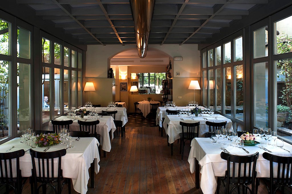 The veranda dining room at La Brisa, looking towards the garden