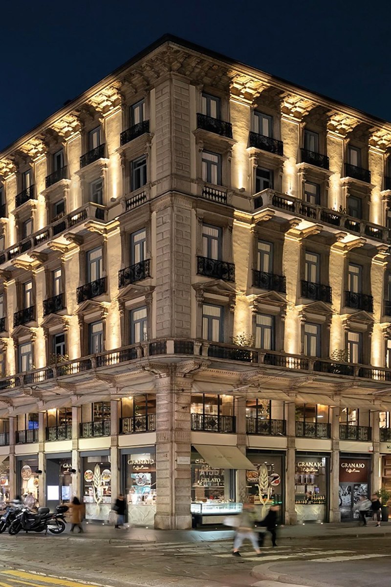 The façade of Matilde Boutique Hotel lit up at night