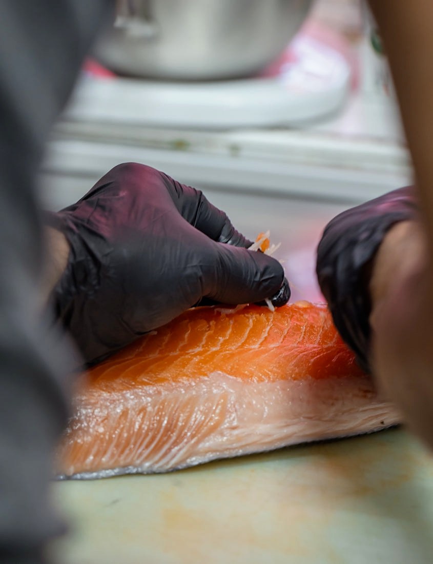 Preparing salmon at Osteria di Brera