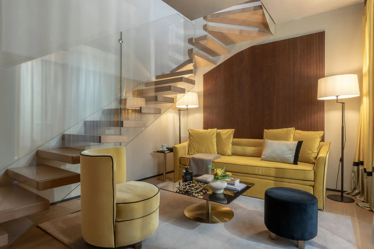 A duplex suite with a walnut staircase at Speronari Suites
