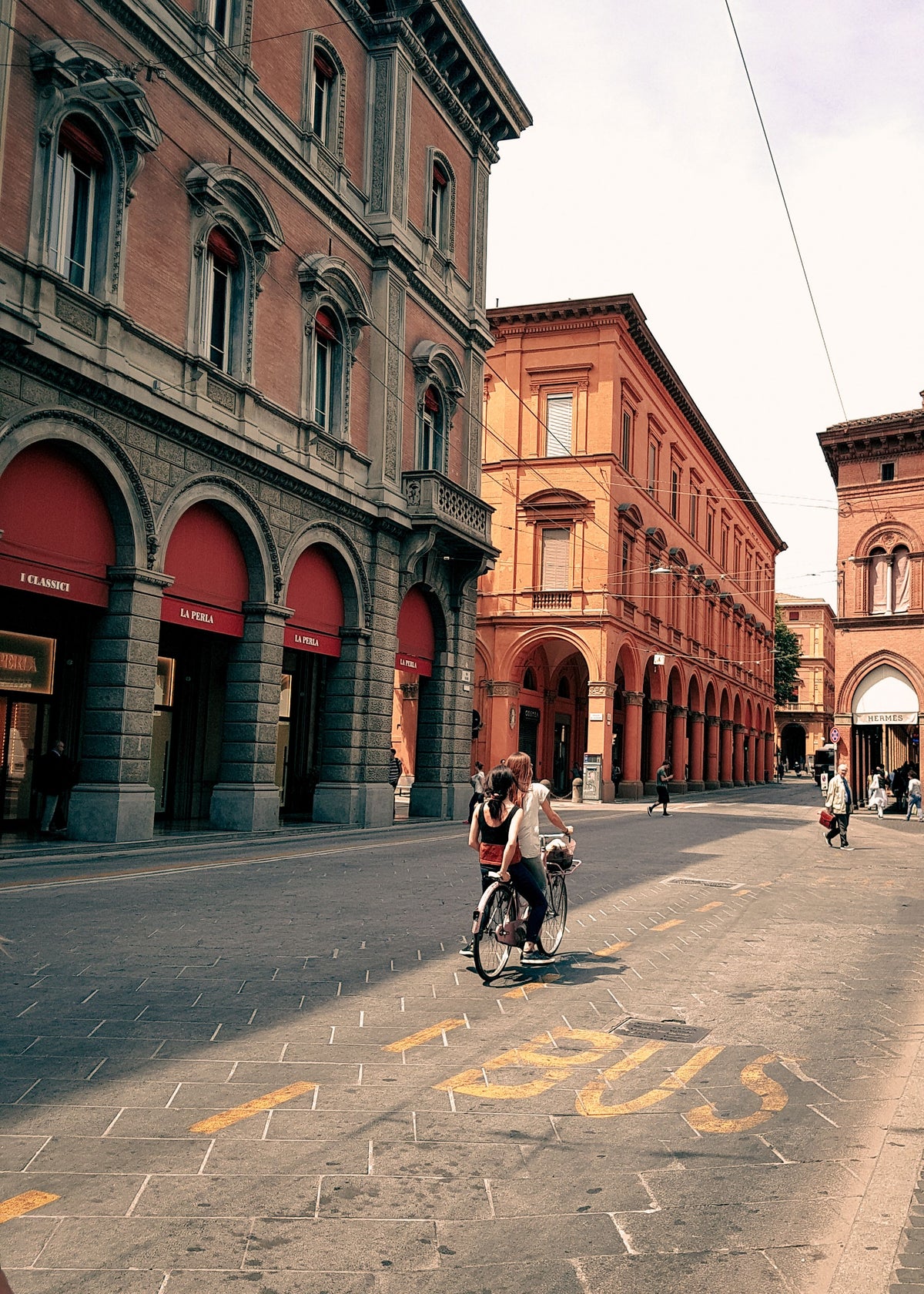 Cycling through the streets of Bologna