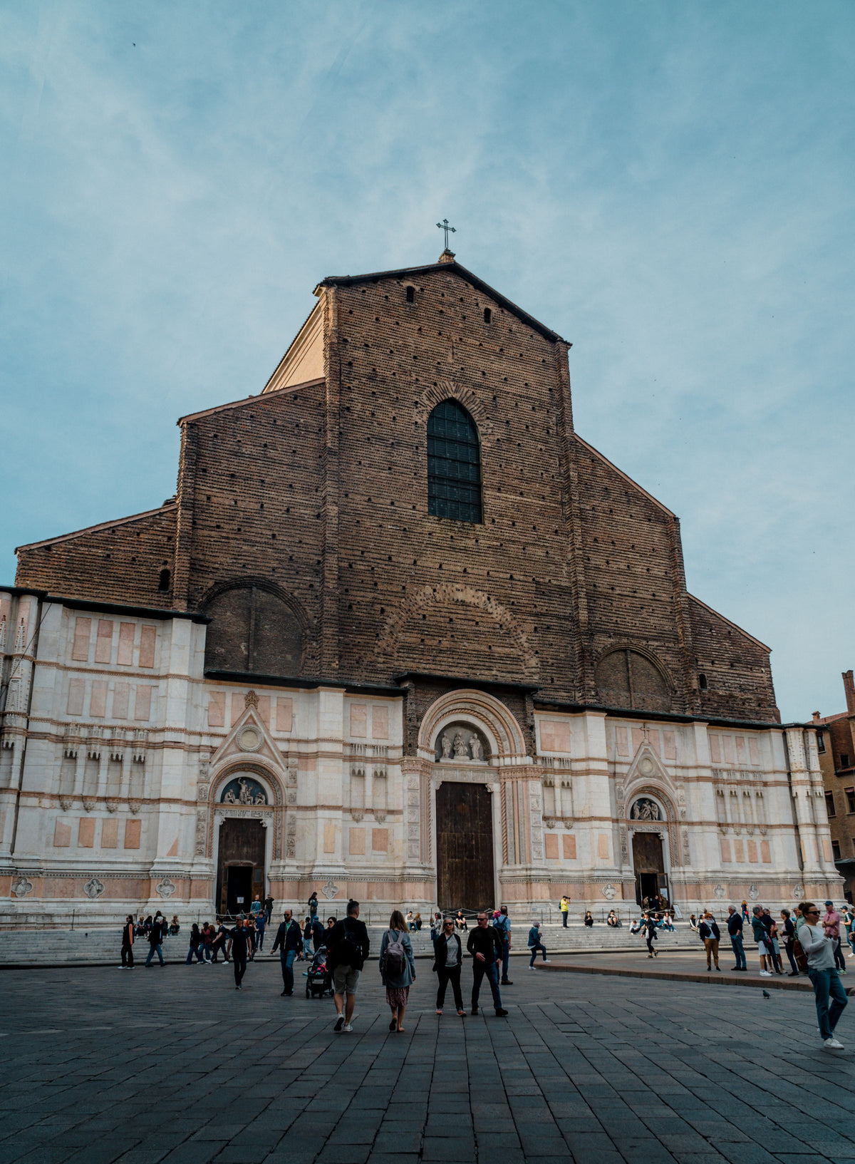 The Basilica of San Petronio with people in Piazza Maggiore